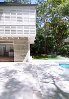 The shading for the upper bedroom floor of this home by Luigi Rosselli Architects is open to an infinite combination of shutter operations. Folding, retractable, tiling blades can be adjusted with the seasons, while the windows below are shaded in the hottest hours by the loggia.