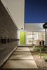 Modern home with Outdoor, Walkways, Gardens, Pavers Patio, Porch, Deck, Concrete Patio, Porch, Deck, Landscape Lighting, and Desert. Front court walkway Photo 2 of Beadle Buddy