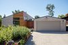 Modern home with Exterior, House, and Wood Siding Material. An exterior material palette of smooth stucco and asymmetrical cedar siding takes cues from the nearby foothills and local topography. Photo 2 of A California Ranch Home, Reimagined