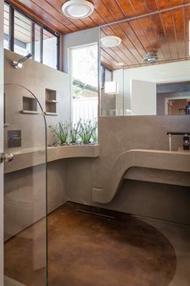 Monolithic concrete 3/4 Bath. Sink, shower, and planter use all the same in-line drain by Infinity.