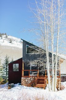Professional backcountry snowboarders Zach and Cindi Lou Grant modernized a run-down A-frame cabin outside of Park City, Utah, to help them access untracked powder and follow their dreams.