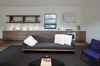 The living area includes a small kitchen so guests can be self-sufficient during their stay.