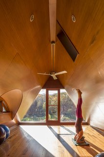 Both James and Anne are avid yoga enthusiasts, so the loft area was built with their sessions in mind.