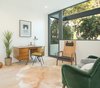 Modern home with Office, Library Room Type, Medium Hardwood Floor, Chair, and Desk. Den Photo 11 of SL House