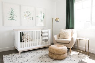 The Ironhorse Residence's nursery by Akin Design Studio features clean, earthy tones and multiple textures—all of which help tie in the hushed palette from the rest of the home. 