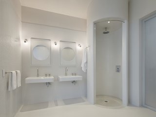 The main bath falls to the "white" family of objects designed by Fiedler Marciano Architecture and is one of architect Mark Fiedler's favorite rooms in the home.
