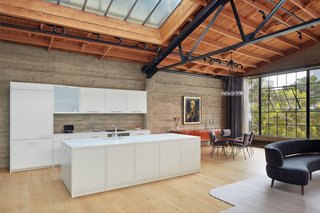 Fiedler Marciano Architecture custom-designed the kitchen to complement the rest of the space, including the custom frames around the cabinets. "That kind of detail—that craft and kind of effort couldn’t happen without the best subcontractors we were fortunate to work with," says architect Martin Marciano.
