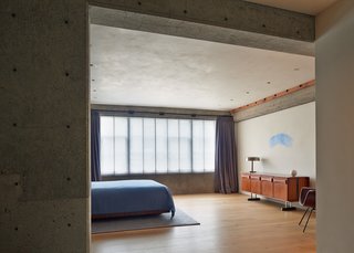 The lofts's original 1928 concrete is intact, and while they sandblasted it all, not everything was removed—the owners will often find things like nails and pieces of cork in the material.