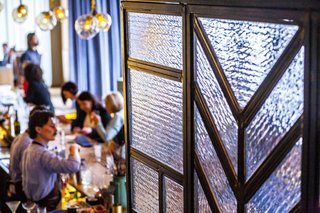 The inspiration for the glass entry design was a reference to the pattern of one of Wright's windows.