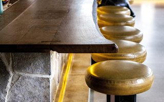 "What struck me always is the way Frank Lloyd Wright used space," says Heisner. "I didn’t want to just copy the Robie house, so I just focused on things like the oak species and incorporated materials he used first-hand. We wanted to bring the outside in."