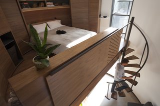  "I wanted polarity between the skin—the solid, pure form—and for human interaction, I wanted warmth," says Christoph Kaiser. After bidding out millwork for an estimated $60,000, Kaiser decided to complete the work himself with the help of his neighbors.