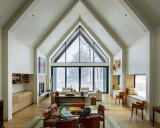 Studio B repurposed and reupholstered much of the existing owners' furniture. Wire-brushed, white oak flooring, cabinetry, and millwork provide cohesiveness throughout the space. 