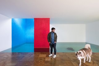 Eduardo Luque, and his dog, Bruno, both have grown up in Casa Gilardi, Luis Barragán's last completed project. 
