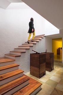 Luis Barragán left walls unadorned. Light switches, fixtures, and stair rails are often absent in his homes.