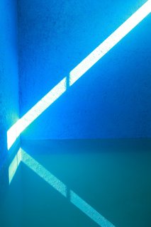 Skylights permeate throughout Barragán homes. Here, light enters the indoor pool, reflecting patterns that change throughout the day.