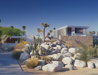 After much research, the original buff stone pictured was discovered at a quarry in Utah, which had since closed but reopened for the material sourcing for this project, the restoration of Richard Neutra's Kaufmann House. A mason worked there for a year and a half to accurately restore stone, chiseling and cutting blocks precisely in place to create a pleasing mosaic. Tops and bottoms of the stones were cut smooth to sit in horizontal position, allowing the sides and faces to be more organic as Richard Neutra intended.