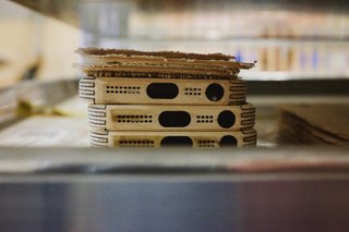 Wood iPhone cases waiting to be finished.