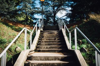 A cement staircase leads to the main Abbey grounds, where the iconic library sits.