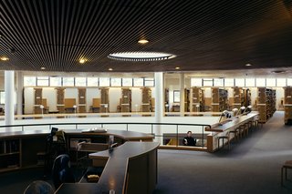 Windows and a large hole in the ceiling paneling bring floods of natural light to the main floor.