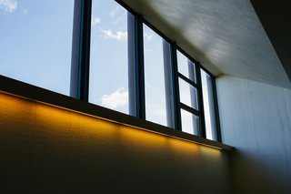 Another sublime moment where textured stone and artificial lighting meet steel and sky.
