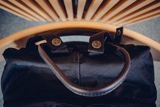 The Fjällräven emblems adorn the black shoulder straps. Black on black keep things subtle.