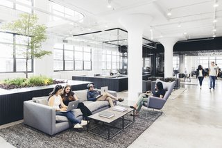 A Look Inside Squarespace NYC - Photo 5 of 10 - In this large open space glass helps to create partitions and natural structure.