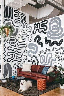 Figma's SF Office Celebrates the Humanity of Work - Photo 5 of 7 - Organic painted patterns create a fun and inviting vibe in this open sitting space.