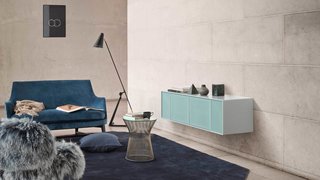 This wall shelf is an efficient storage solution in a living room or large open space.
