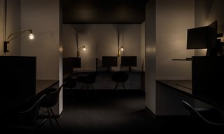 These dimly lit, private workspaces offer a way for employees to find focus and heads-down time away from the bustle of larger open spaces.