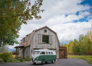 A Guest Barn in Jackson, Wyoming, Fuses Modern and Rustic Elements - Photo 6 of 7 - A classic VW bus in vintage colors shows both the scale and scope of The Barn and its surrounding scenery.