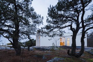 A Modern Finnish Villa That Grows Out of a Seaside Cliff - Photo 1 of 11 -