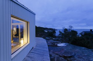 A Modern Finnish Villa That Grows Out of a Seaside Cliff - Photo 2 of 11 -