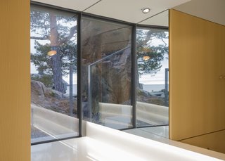 A Modern Finnish Villa That Grows Out of a Seaside Cliff - Photo 6 of 11 -