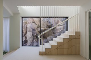 A Modern Finnish Villa That Grows Out of a Seaside Cliff - Photo 8 of 11 -