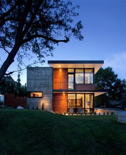 "Being a younger couple, they were very open to exploring ideas of material, design and space," said Ken Andrews. Arch11 is well-versed in creating an aesthetic they define as "dirty modern." They choose materials and methods that unite fresh, contained structures and offer an elemental feel. "