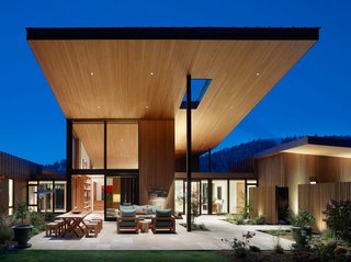 RCR – Resting on eight acres, this 9,000-square-foot Montana house is actually a series of connected buildings surrounding an elevated courtyard. Built for a couple whose previous ranch property was designed by famed Argentinian architect Emilio Ambasz, the home was constructed around two central priorities. First came siting strategy, which takes advantage of a meadow that runs up against the base of a butte with old growth pine. Next came the creation of a space suitable for the clients’ world class art collection – a compound contextual enough to fit the surrounding area, strong enough to stand on its own merits, and flexible enough to let the art shine through. The interiors feature a reductive materials palette, with wood and plaster surfaces that add warmth without competing with the show-stopping pieces scattered throughout the home. Photos by Matthew Millman
