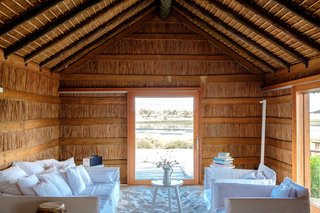 Portugal’s Thatched-Roof Beach Cabins Bring the Outdoors In - Photo 4 of 5 -
