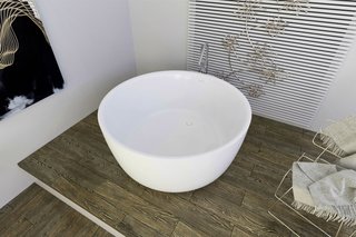 PureScape 720 is a minimalistic, freestanding, bowl-shaped tub, which has been hand crafted in Italy using Aquatica’s technologically advanced AquateX™ solid surface material. Its soft, velvety surface juxtaposes the material's unparalleled heat retention and durability. With a petite footprint of 53.25" in diameter, PureScape 720 is considerately designed for even the most compact of spaces.