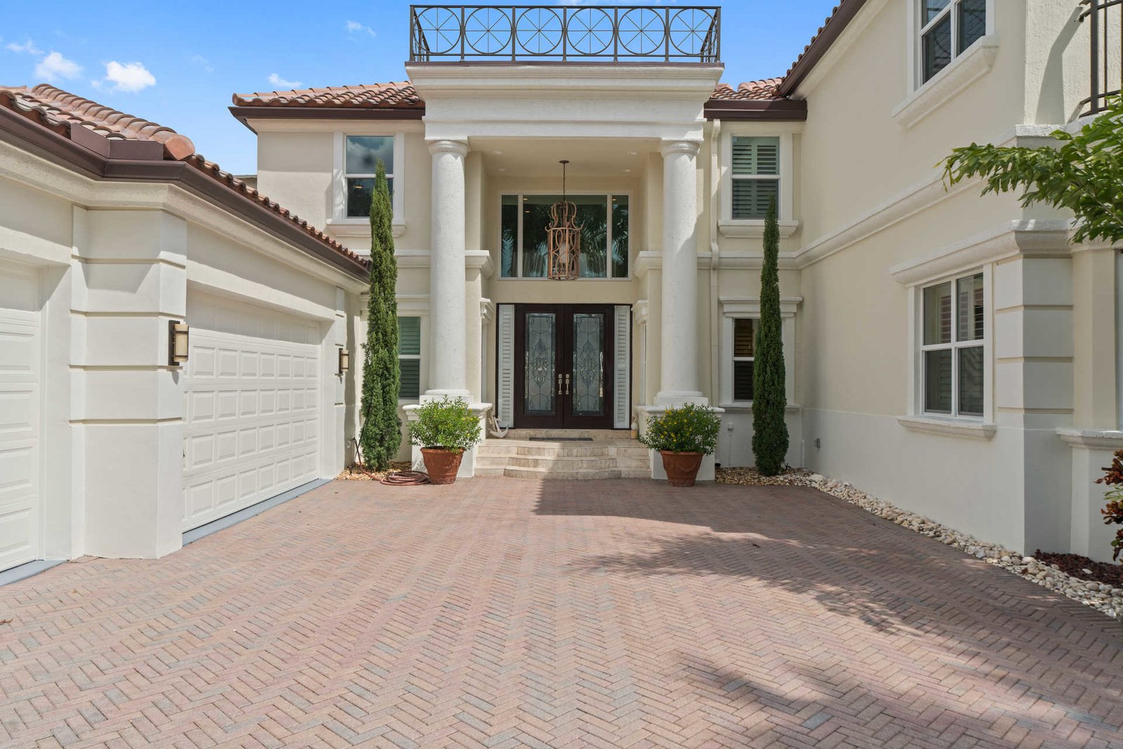A Modern Mediterranean Estate on Florida’s Lake Rogers Modern Home in