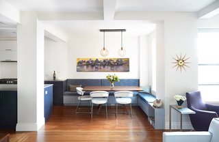 5 Main Ingredients For Cooking Up a Homey Kitchen Nook - Photo 5 of 8 - A modern breakfast nook boasts an abundance of natural light and a large, multi-functional space with built-in storage.