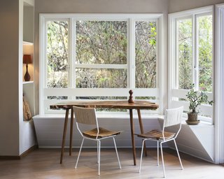 5 Main Ingredients For Cooking Up a Homey Kitchen Nook - Photo 8 of 8 - A beautifully simple shiplap built-in banquette balances perfectly with a live edge table, making the most of the abundant natural light. 