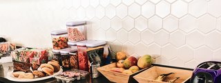 Culture by Design: Datadog HQ - Photo 2 of 3 - Certain pops of color throughout the space, and the honeycomb backsplash shown here, mimic the product. Nuanced touches such as these bring a smile to the face of those who are in the know.