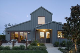 This contemporary farmhouse was designed for a client that loves to cook and entertain in the open air.