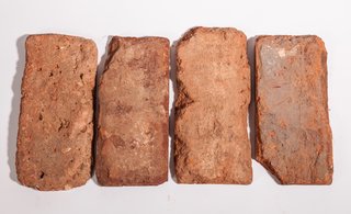 If you feel like the bricks inside your apartment don't look as nice as the ones on the outside of your building, you're probably right. Interior wythes of brick were typically of a lower quality than exterior face brick.