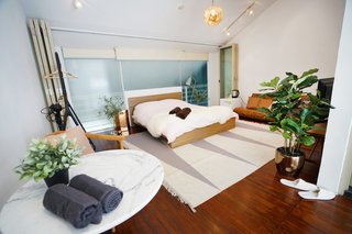 The Scandinavian-inspired Kinfolk Loft is a room in the Shophouse Enclave, one of seven beautifully-conserved Singaporean shophouses that were designed with a 1930s Singapore-Chinese-Baroque aesthetic. 