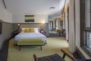 Located in a heritage building in Singapore’s Chinatown, The Club is a 20-room boutique hotel furnished in earthy tones and bespoke furniture designed by Singapore studio, Ministry of Design. 