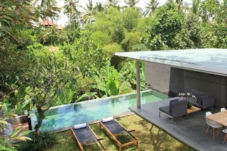 Located in the artsy town of Ubud, and nestled within a verdant green valley, the eco-friendly Aria Villas was designed by Singapore architect Chioh-Hui Goh, and offers a fresh take on Balinese style.