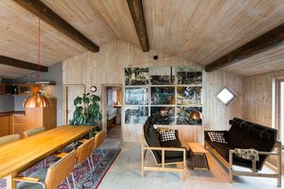 "If you're on the run, you can hide at our place. It's close to the sea and close to the sky, but it's far from everything else," reports Claus, the owner of The Great Escape, a two-bedroom houseboat in Copenhagen with a hip, industrial feel.