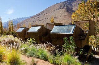 Elqui Domos, a hotel in Chile’s Elqui Valley, offers "observatory rooms"—triple-level wooden cabins on the upper slope of the land that offer direct views of the dramatic scenery.