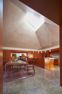 Red Tin House That Makes the Most of Space and Light - Photo 1 of 9 -